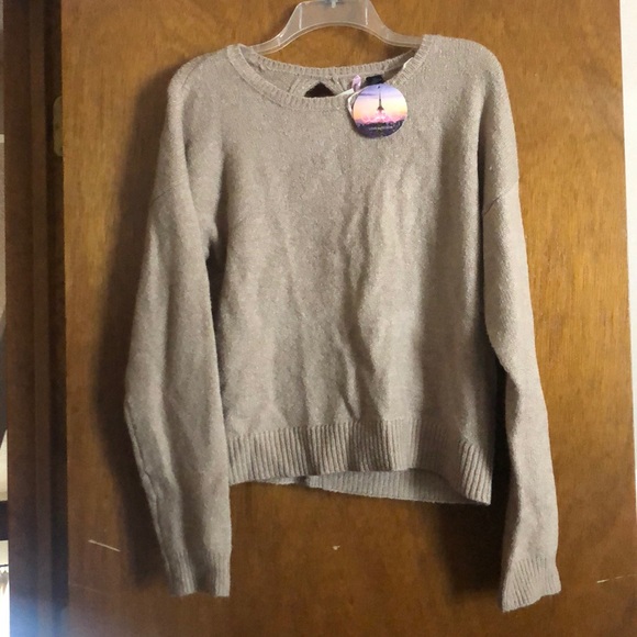 Brown sweater with bow ties on back. - Picture 2 of 3